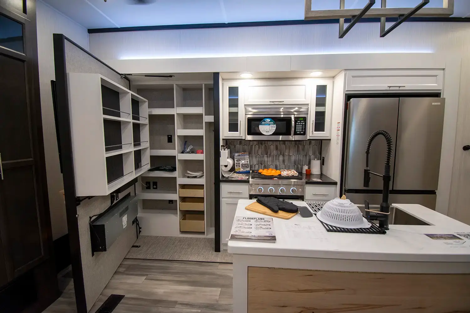 Hidden pantry behind the TV in the main room